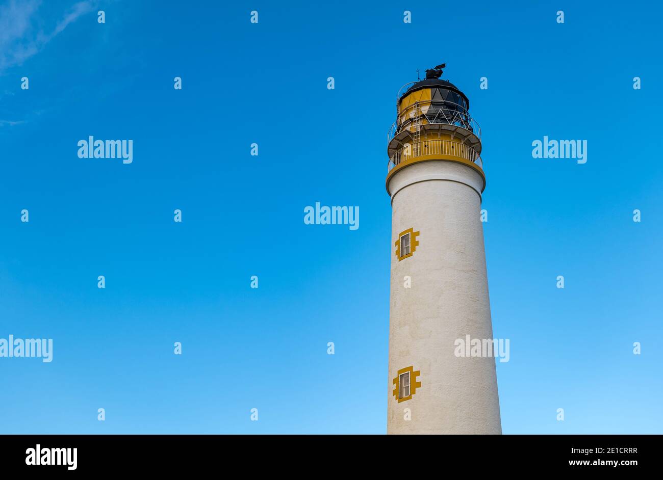 Close up of Barns Ness Stevenson lighthouse tower and clear blue sky, East Lothian, Scotland, UK Stock Photo