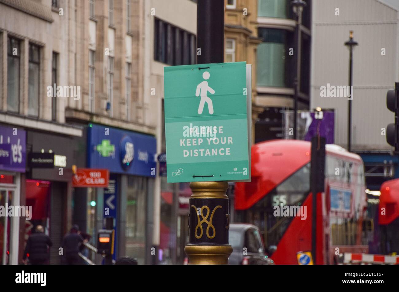 A social distancing sign on Oxford Street, London. Stock Photo