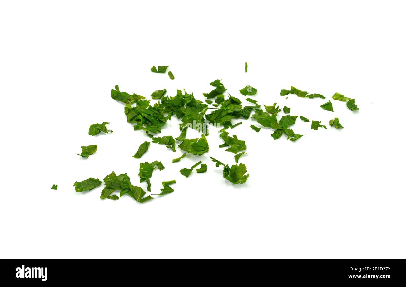 Fresh green chopped parsley leaves isolated on white background and ...