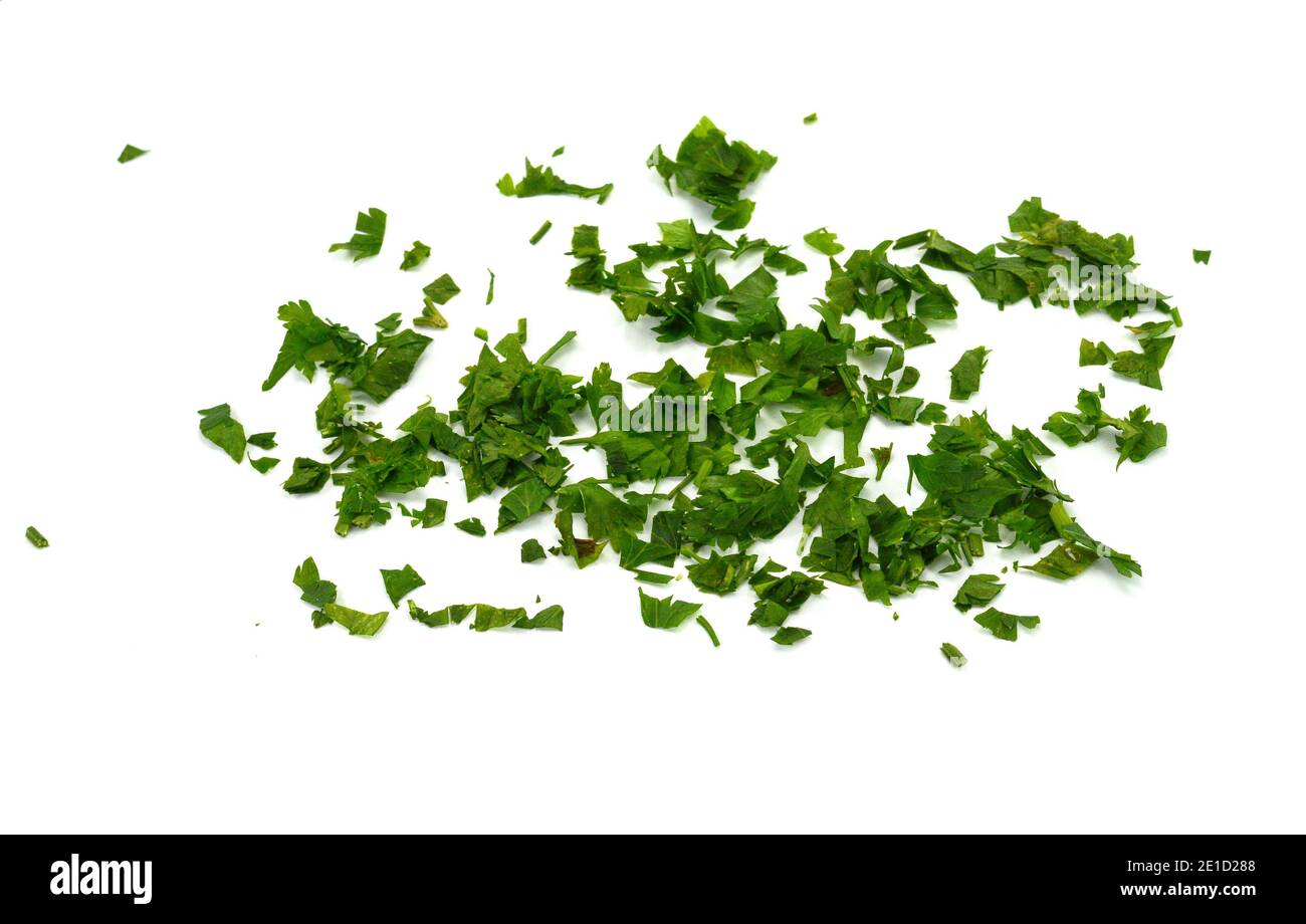 Fresh green chopped parsley leaves isolated on white background and ...