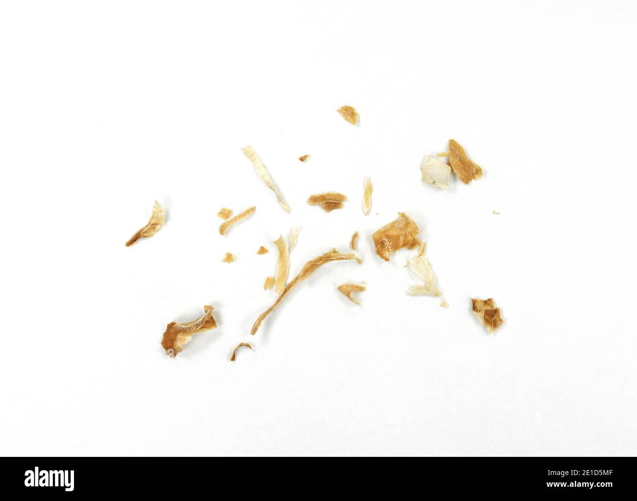 Dried Minced Onions on a White Background. Onion flakes isolated on