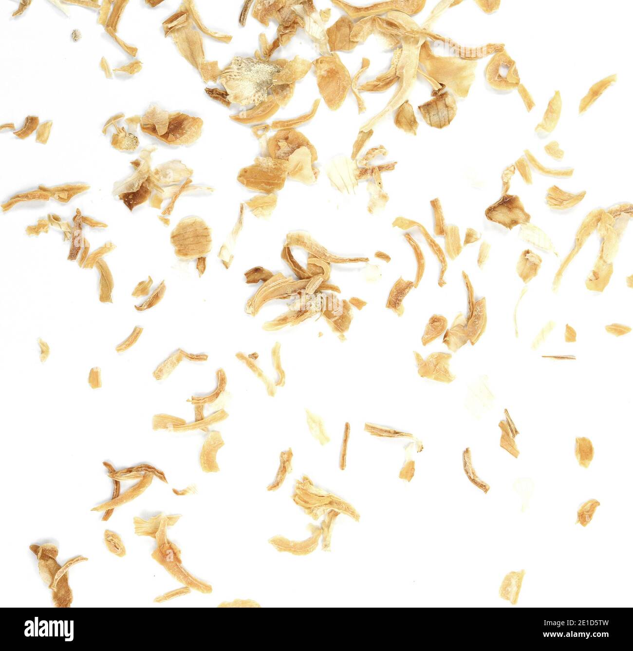 Dried Minced Onions on a White Background. Onion flakes isolated on white background Stock Photo