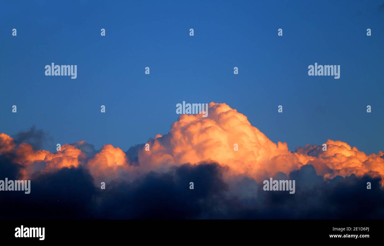 Photo of a beautiful sky with sunset clouds season Stock Photo - Alamy