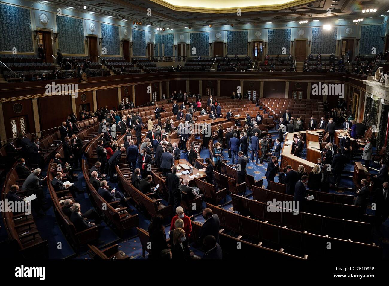 Senators and Senate clerks leave to debate the certification of Arizona's Electoral College votes from the 2020 presidential election during a joint session of Congress on Wednesday, January 6, 2021.Credit: Greg Nash/Pool via CNP /MediaPunch Stock Photo