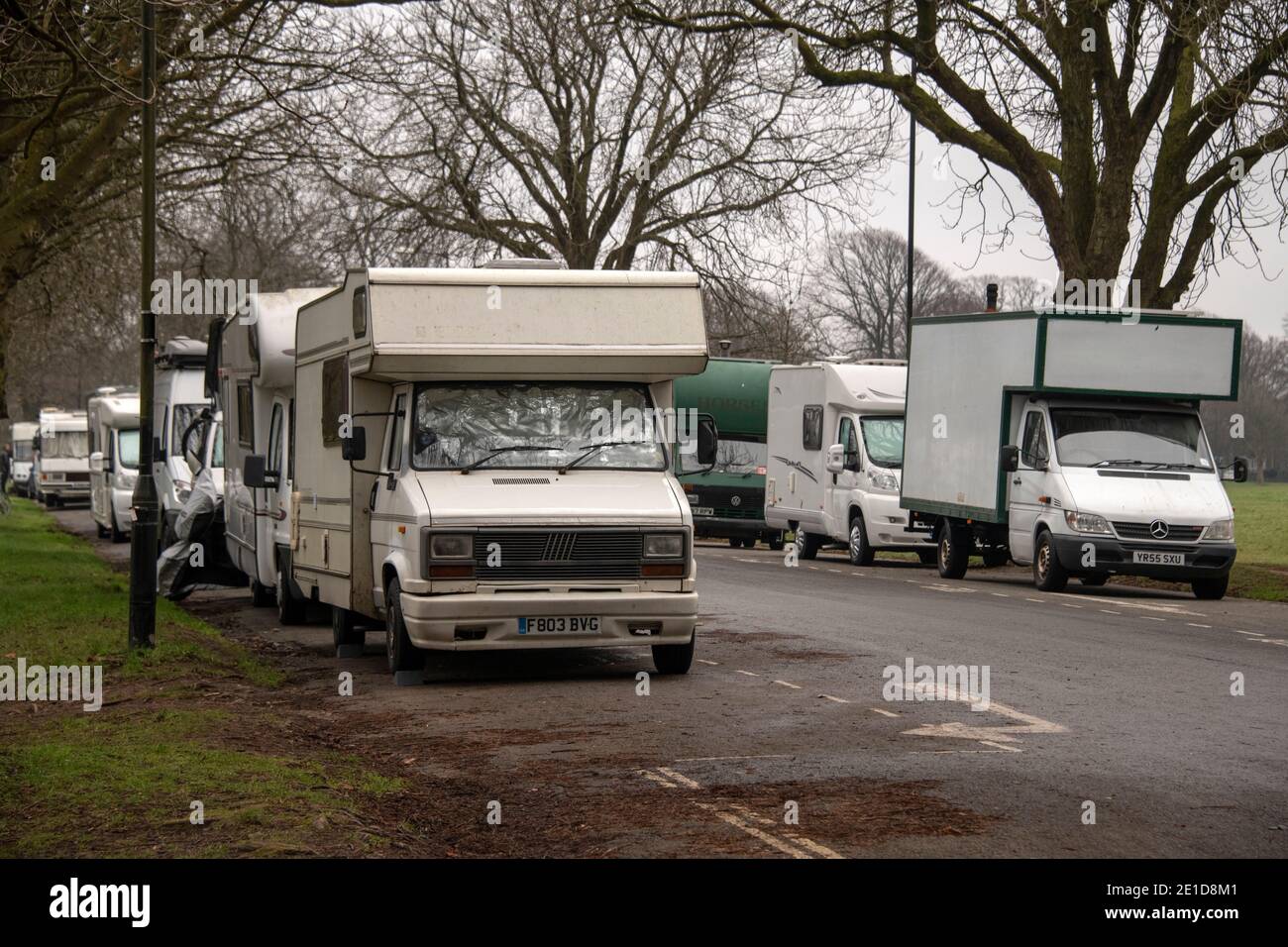 Van dweller community living in camper homes, vans and horse boxes, parked on public roads on Durdham Downs, Westbury-on-Trym, Bristol, UK. Stock Photo