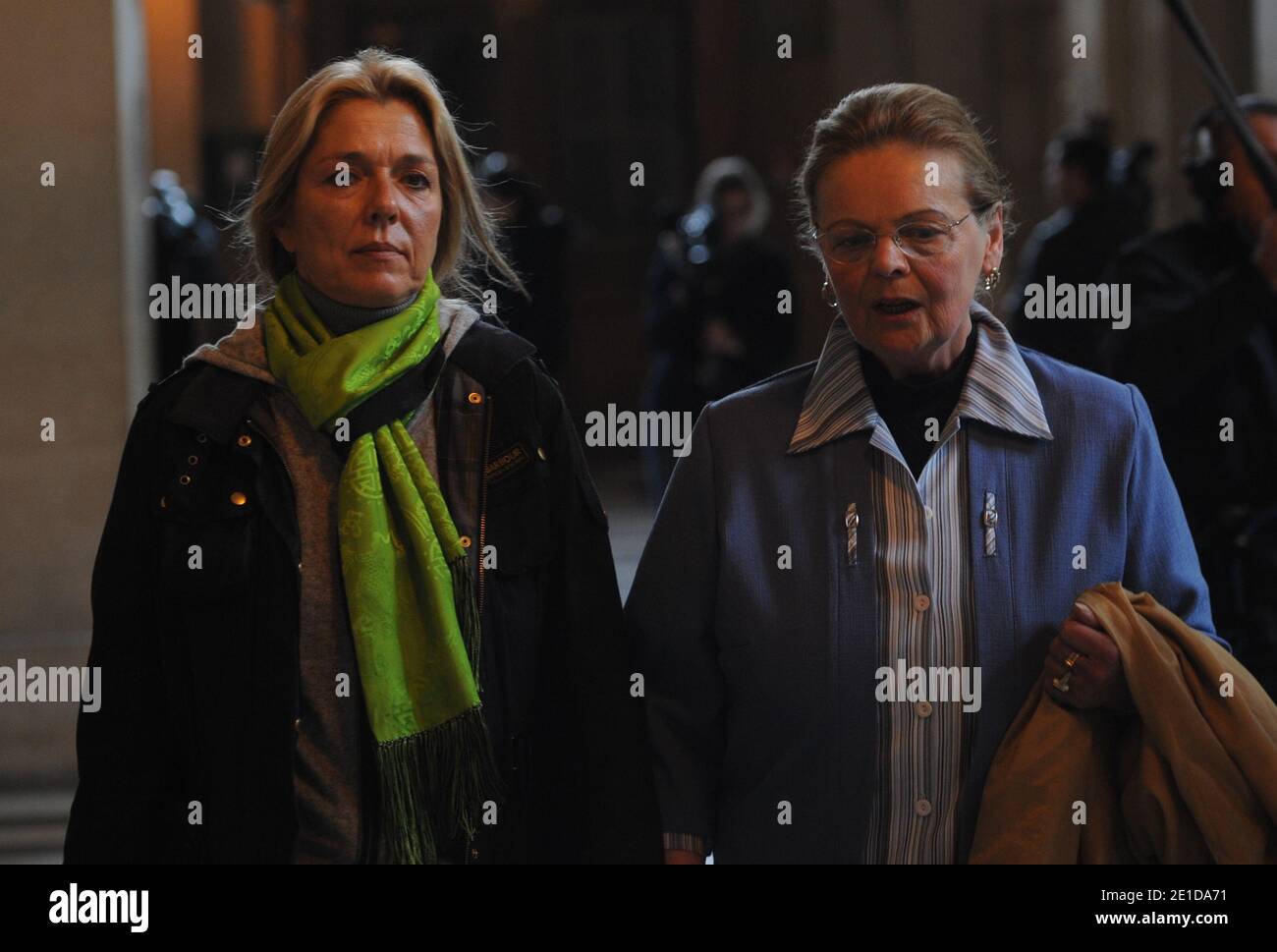 Diana Gunther (L), the daughter of German cardiologist Dieter Krombach, and Krombach's sister (R) at the Palais de Justice where they attended the second day of Krombach's trial for the murder of Kalinka Bamberski, in Paris, France on March 30, 2011. The French court today decided to continue the trial of the German doctor, who is accused of having raped and killed his then 14-year-old stepdaughter, Kalinka Bamberski, in the summer of 1982 while she was holidaying with her mother at Krombach's home at Lake Constance, southern Germany. A court in Germany ruled that Krombach could not be held re Stock Photo