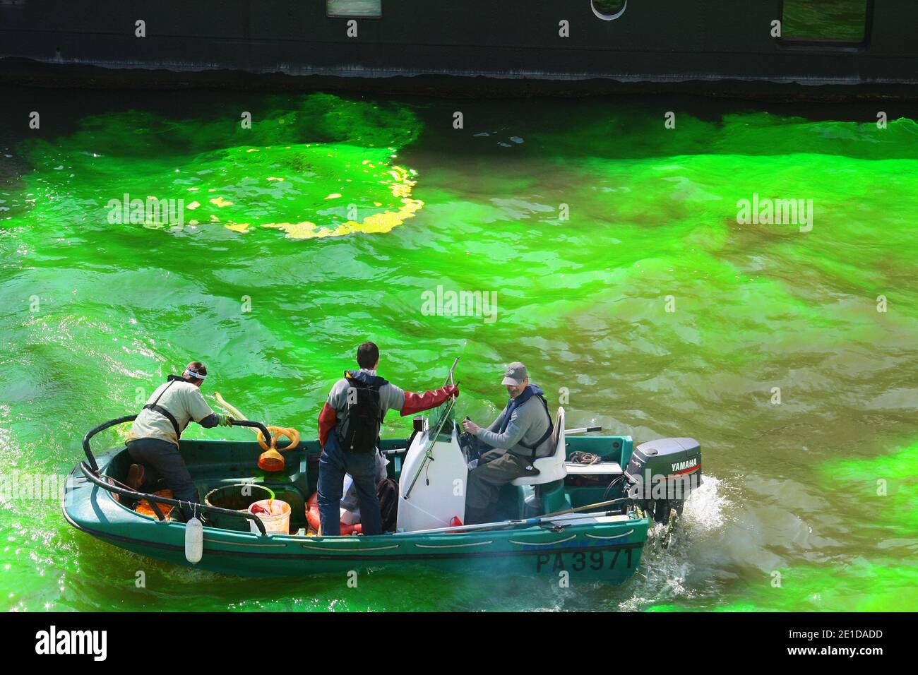 Environment emplyees tip a fluorescent product into the river Seine, Paris, France on March 22, 2011, as part of the World Water Day celebrations. The UN's food agency marked World Water Day, today by calling for new and innovative approaches to ensuring city dwellers in developing countries have access to safe and adequate water supplies. Photo by David Fritz/ABACAPRESS.COM Stock Photo