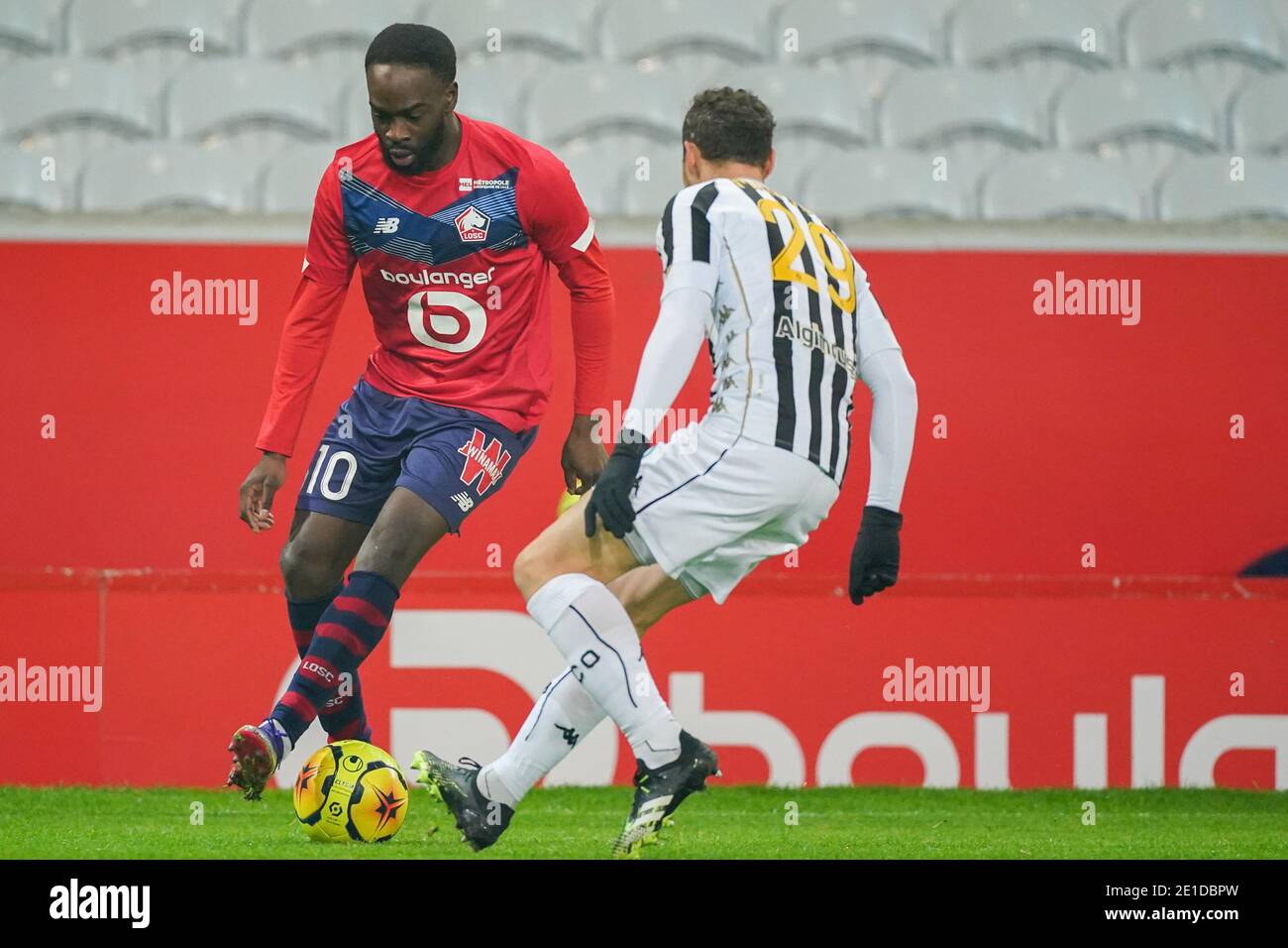 LILLE, FRANCE - JANUARY 6: Jonathan Ikone of Lille OSC, Vincent Manceau of Angers SCO during the Ligue 1 match between Lille OSC and Angers SCO at Stade Pierre Mauroy on January 6, 2021 in Lille, France (Photo by Jeroen Meuwsen/BSR Agency/Alamy Live News)*** Local Caption *** Jonathan Ikone, Vincent Manceau Stock Photo