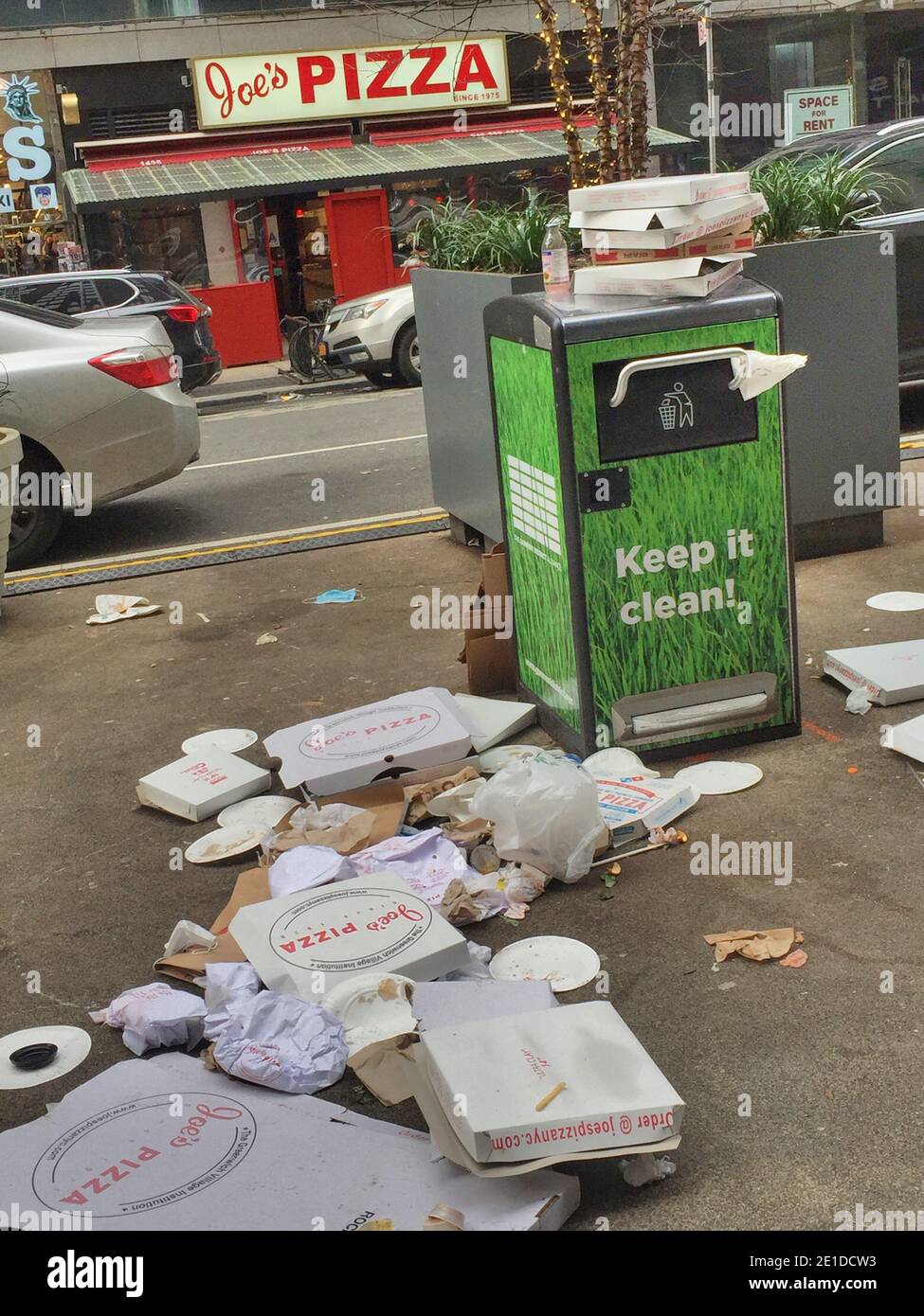 Pizza Boxes Litter broadway the Morning After New Years Eve Celebration, NYC, USA Stock Photo