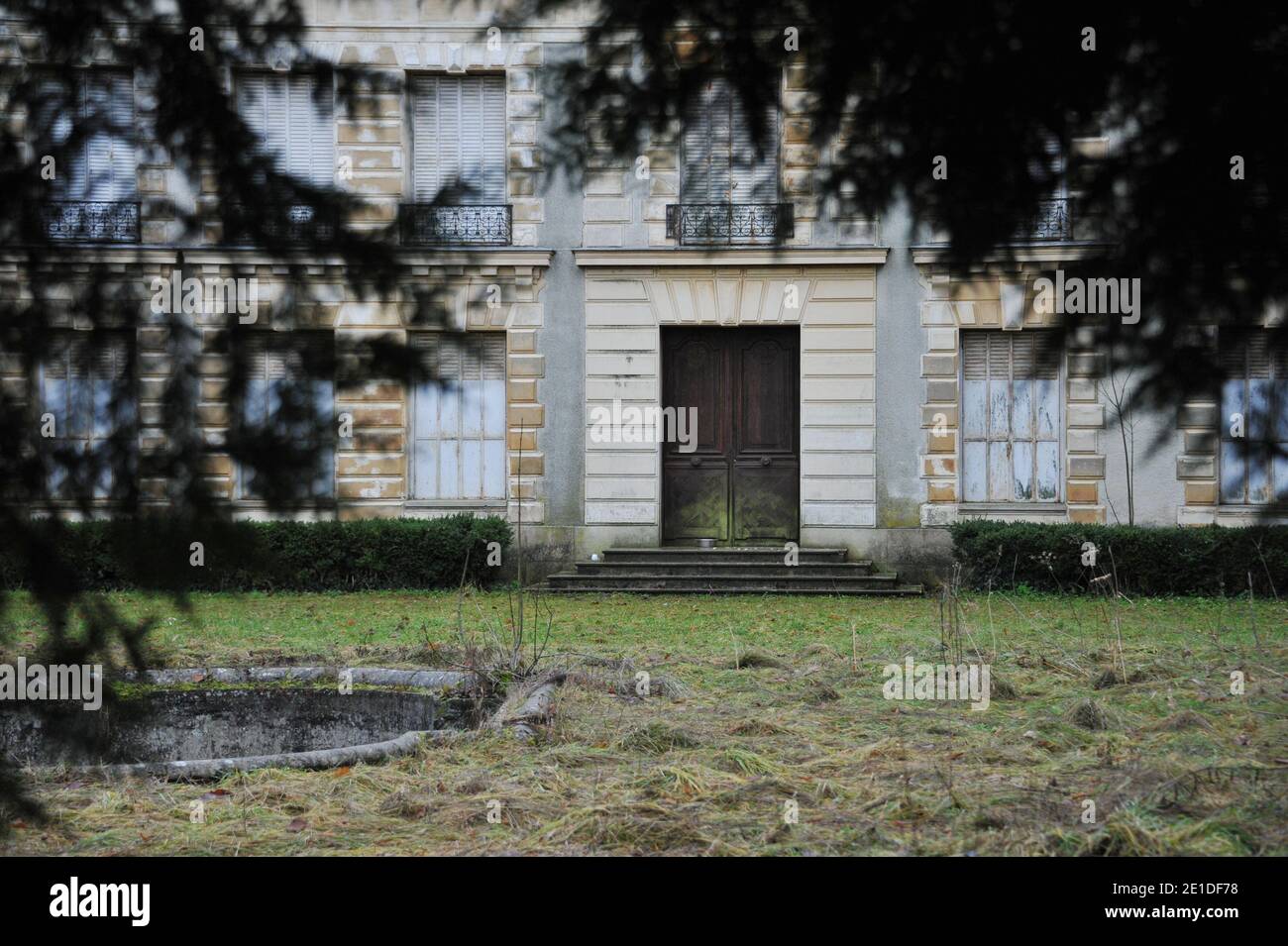 The African dictator Bokassa's castle in Hardricourt near Paris on January 13, 2011. The French castle that once belonged to African dictator Jean-Bedel Bokassa has sold for 915,000 euros.The dilapidated 'Chateau d'Hardricourt' was bought by an anonymous bidder at an auction in Versailles. Bokassa spent several years living in the mansion in the western Paris suburb of Hardricourt after he was overthrown as leader of the Central African Republic (CAR) in 1979. 'Electricity, water, heating - all need to be overhauled,' Pascal Koerfer, lawyer for the administrator of the Bokassa estate. The prop Stock Photo