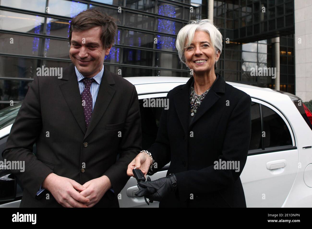 French Minister for the Economy, Finance and Industry Christine Lagarde poses as she drives an Ion Peugeot full electric car, in Paris, France, on January 20, 2011. The Economy ministry will use the four seat four-door city ion car, launched at the end of 2010. Photo by Stephane Lemouton/ABACAPRESS.COM Stock Photo