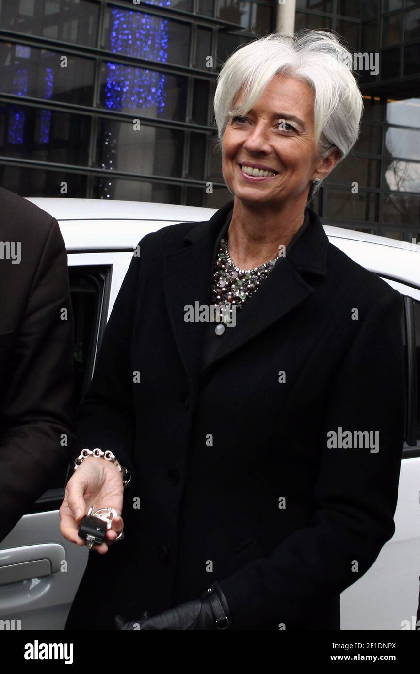 French Minister for the Economy, Finance and Industry Christine Lagarde poses as she drives an Ion Peugeot full electric car, in Paris, France, on January 20, 2011. The Economy ministry will use the four seat four-door city ion car, launched at the end of 2010. Photo by Stephane Lemouton/ABACAPRESS.COM Stock Photo