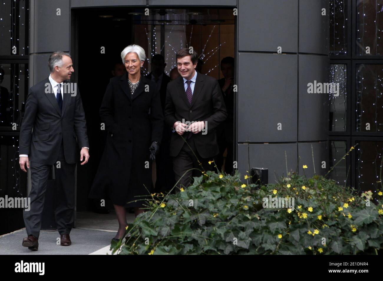 French Minister for the Economy, Finance and Industry Christine Lagarde flanked Peugeot Managing Director Vincent Rambaud arrives for drive an Ion Peugeot full electric, in Paris, France, on January 20, 2011. The Economy ministry will use the four seat four-door city ion car, launched at the end of 2010. Photo by Stephane Lemouton/ABACAPRESS.COM Stock Photo