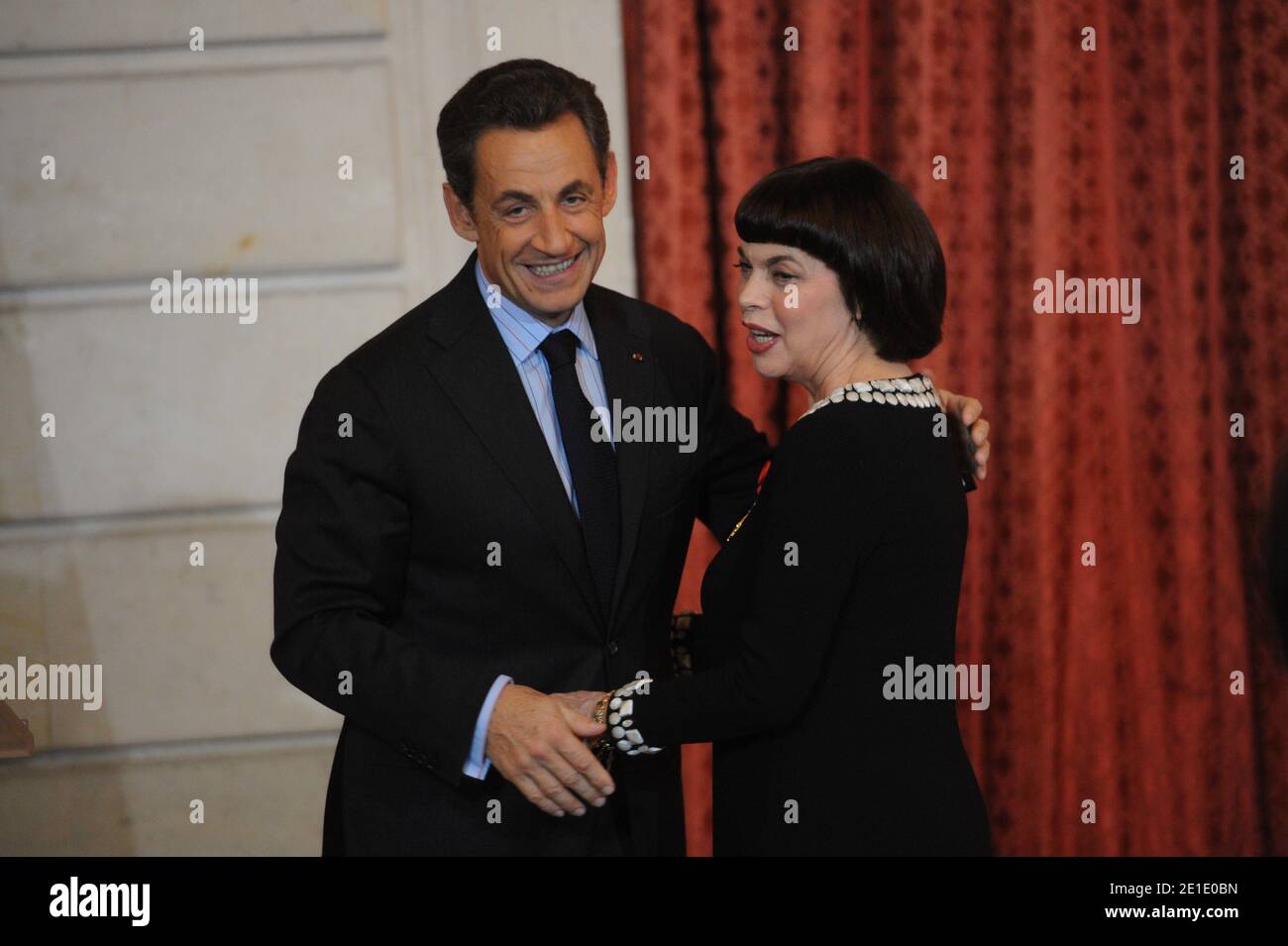 French singer Mireille Mathieu receives the Legion d'Honneur by French President Nicolas Sarkozy at Elysee Palace in Paris, France on January 26, 2011. Photo by Mousse/ABACAPRESS.COM Stock Photo
