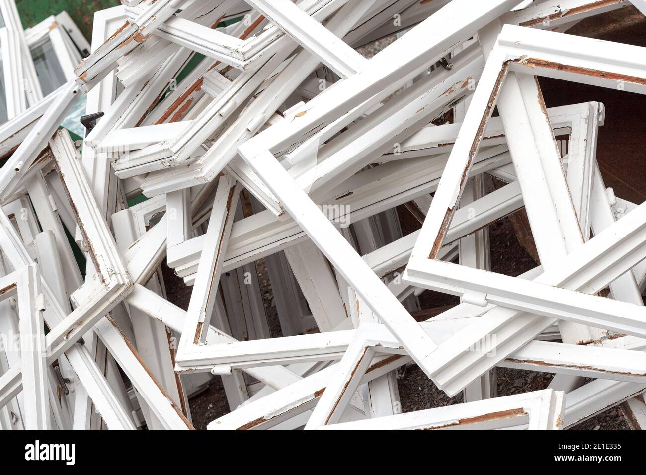 Construction and reconstruction concept, replacing windows. Heap of old