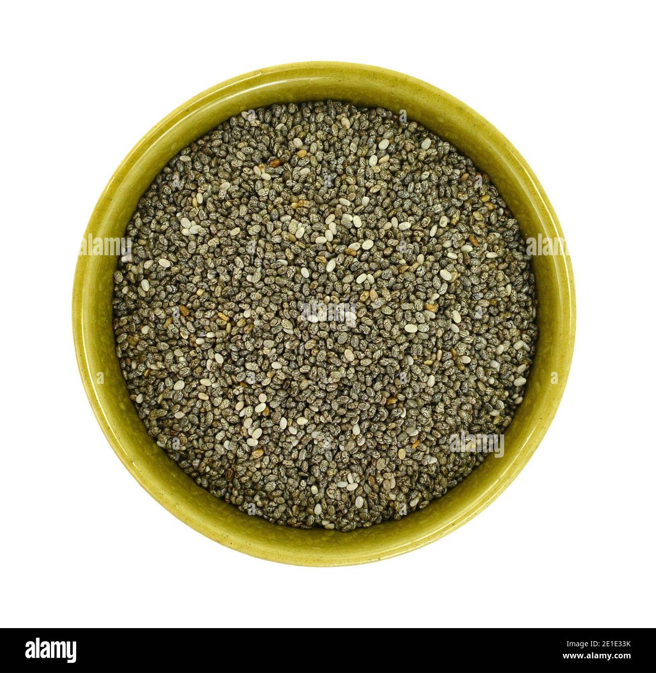 Chia seeds in a bowl isolated on white background. heap of natural