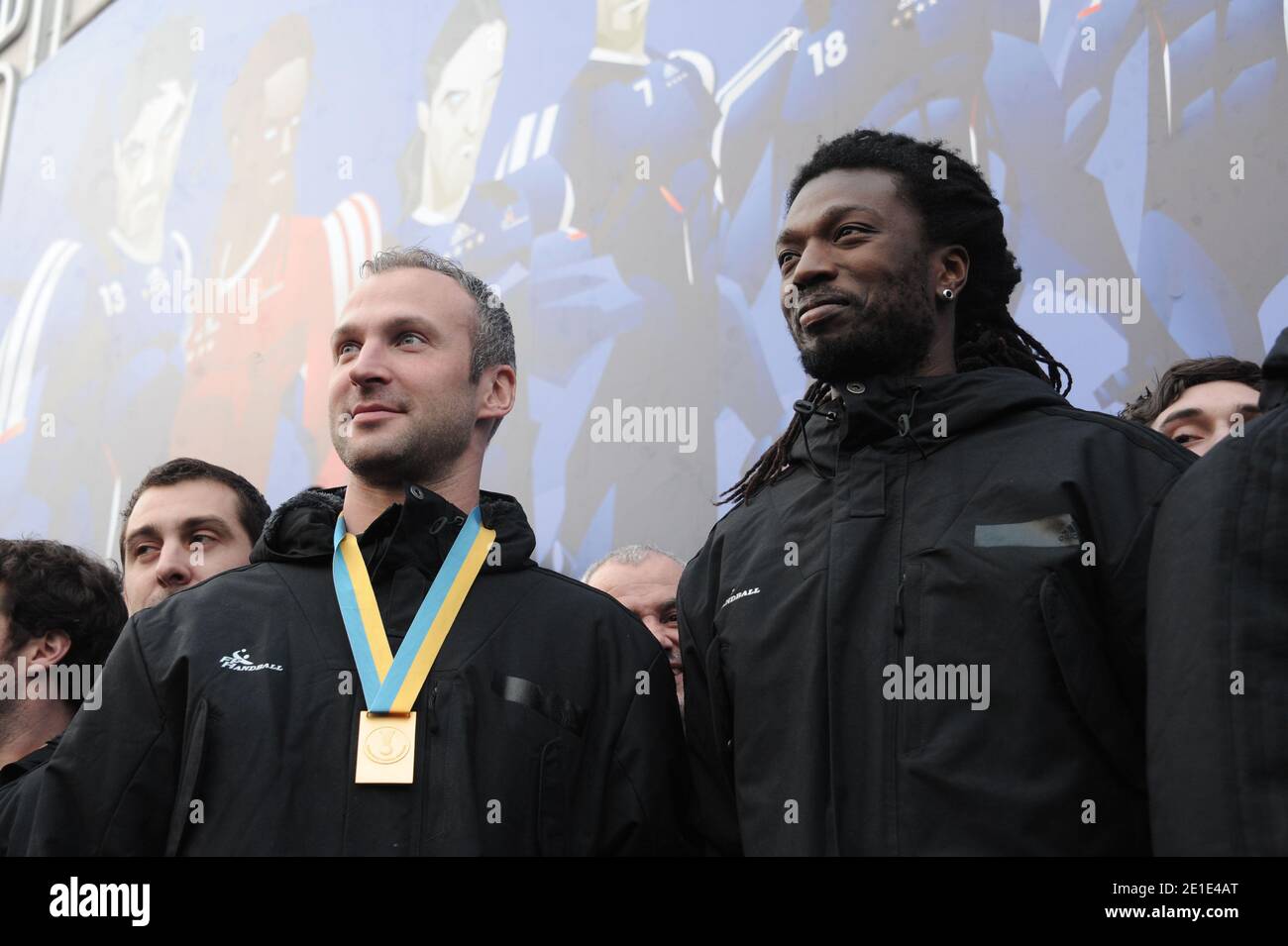 France's Daouda Karaboue and Thierry Omeyer arrive for a autographs session  and press conference at Adidas Store on the Champs Elysees avenue in Paris,  France on January 31, 2011 after winning the