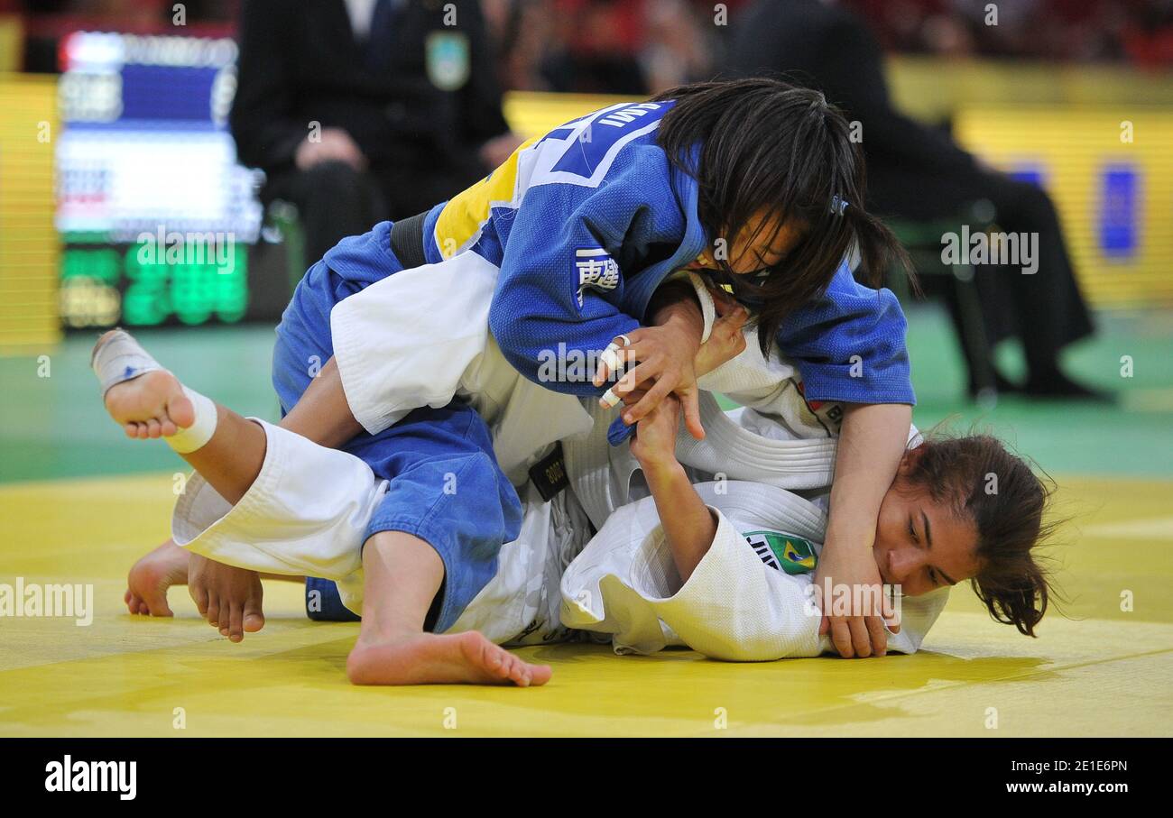 Japan's Haruna Asami (blue) battles withBrasil's Sarah Menezes (white) in the women -48 kg category during the IJF Grand Slam International tournament at the Bercy Stadium in Paris, France on February 5, 2011. Photo by Christophe Guibbaud/ABACAPRESS.COM Stock Photo