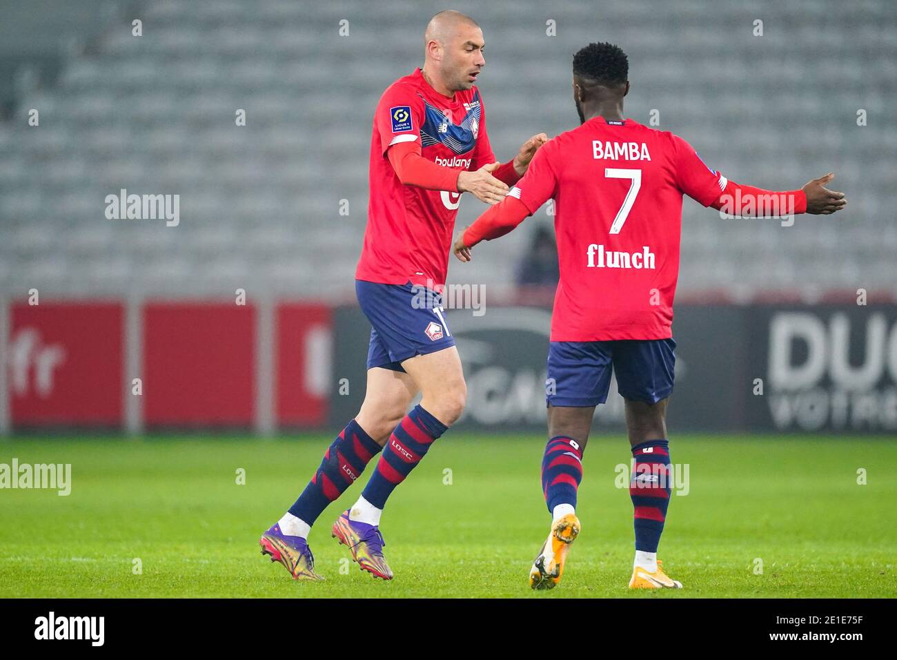 LILLE, FRANCE - JANUARY 6: Burak Yilmaz of Lille OSC celebrating his goal, Jonathan Bamba of Lille OSC during the Ligue 1 match between Lille OSC and Angers SCO at Stade Pierre Mauroy on January 6, 2021 in Lille, France (Photo by Jeroen Meuwsen/BSR Agency/Alamy Live News)*** Local Caption *** Burak Yilmaz, Jonathan Bamba Stock Photo