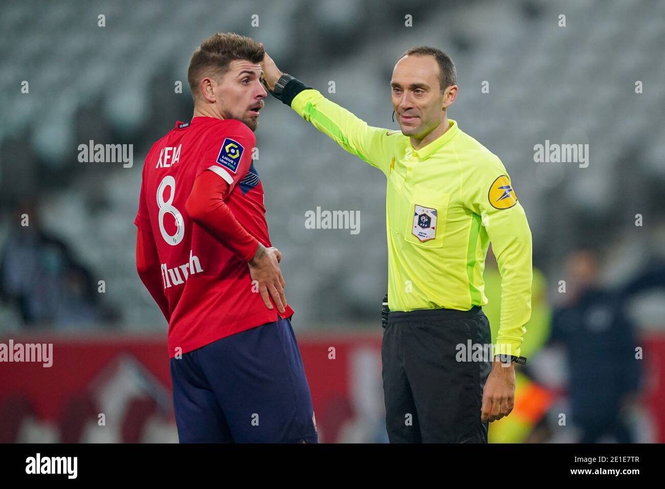 LILLE, FRANCE - JANUARY 6: Xeka of Lille OSC, referee Thomas Leonard during the Ligue 1 match between Lille OSC and Angers SCO at Stade Pierre Mauroy on January 6, 2021 in Lille, France (Photo by Jeroen Meuwsen/BSR Agency/Alamy Live News)*** Local Caption *** Xeka, Thomas Leonard Stock Photo