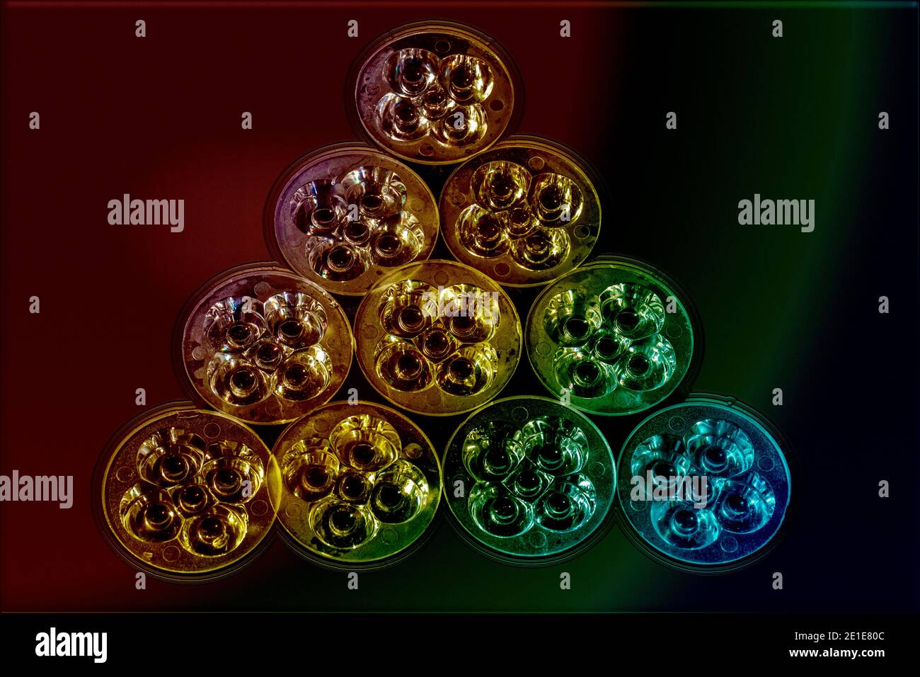 Reflectors under a multi-colored light streak Stock Photo