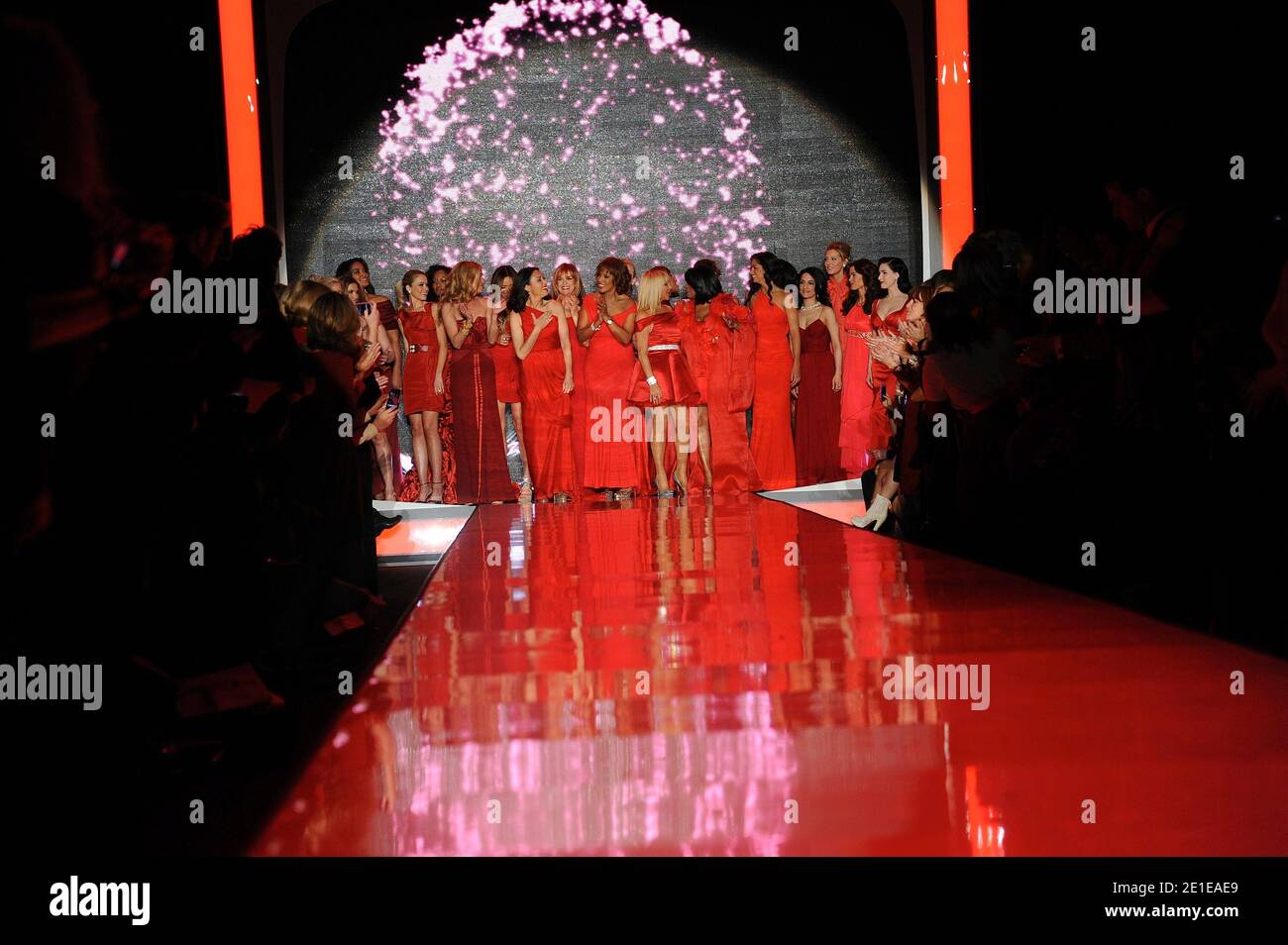 L-R: Katrina Bowden, Garcelle Beauvais, Cat Deeley, Giuliana Rancic, Ann Curry, Linda Gray, Gayle King, Suzanne Somers, Patti LaBelle, Camila Alves, Archie Panjabi, Eva Amurri, Denise Richards and Dita Von Teese on the runway during the Heart Truth's Red Dress Collection 2011 held during Mercedes Benz New York Fashion Week at Lincoln Center in New York City on February 09, 2011. Photo by Graylock/ABACAPRESS.COM Stock Photo
