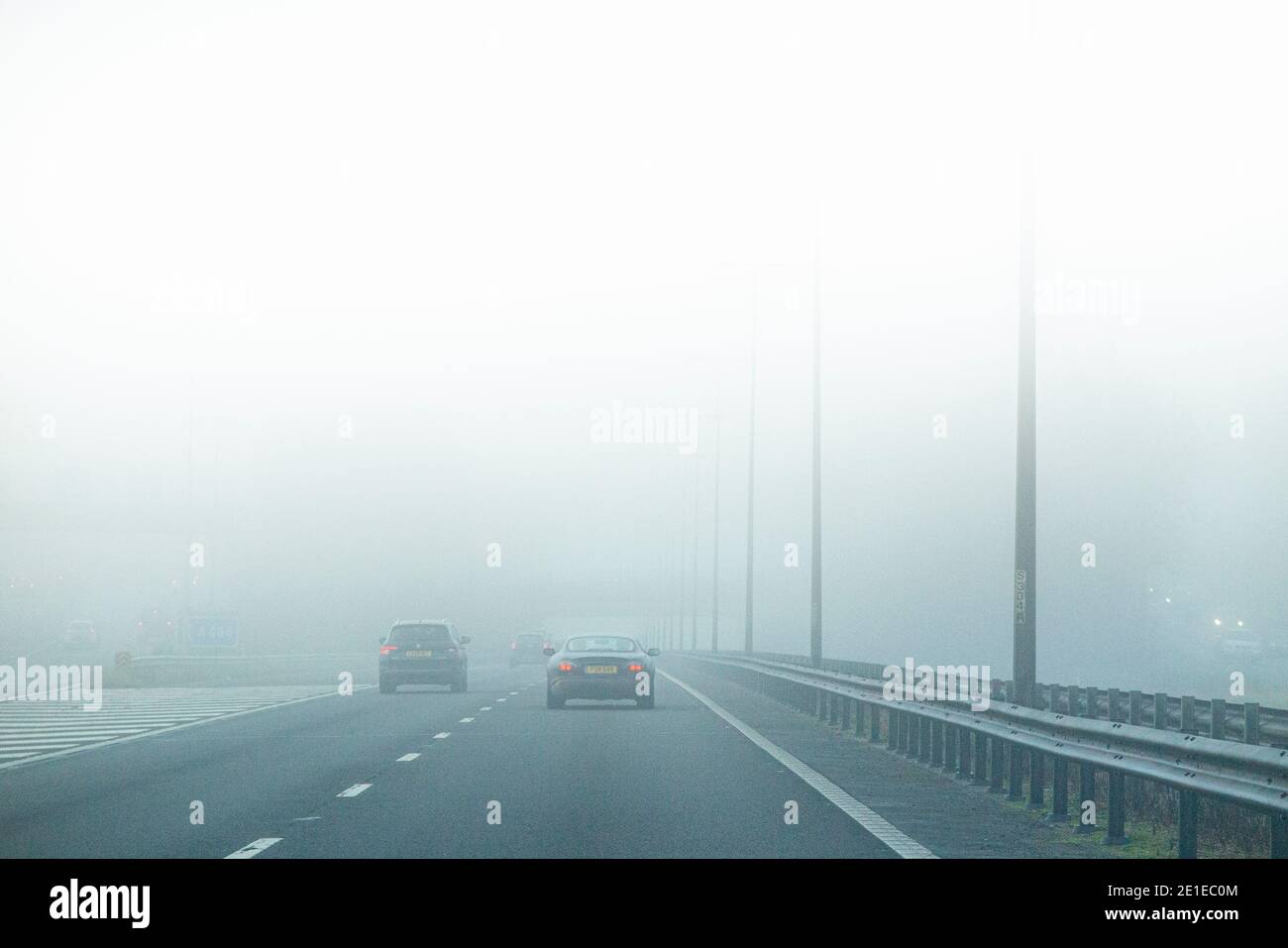 Foggy driving conditions on the M40 in thick fog Stock Photo Alamy