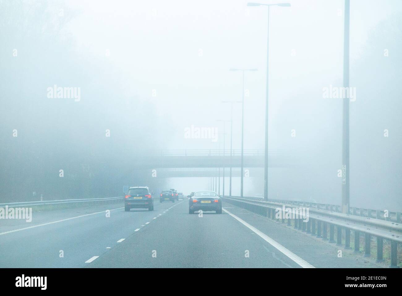 Foggy driving conditions on the M40 in thick fog Stock Photo Alamy
