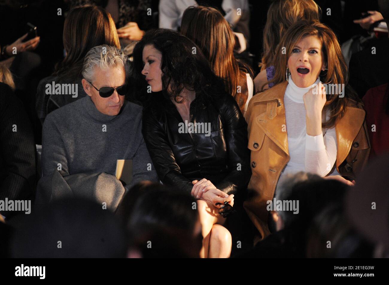 Michael Douglas and Catherine ZetaJones sit front row at the Michael