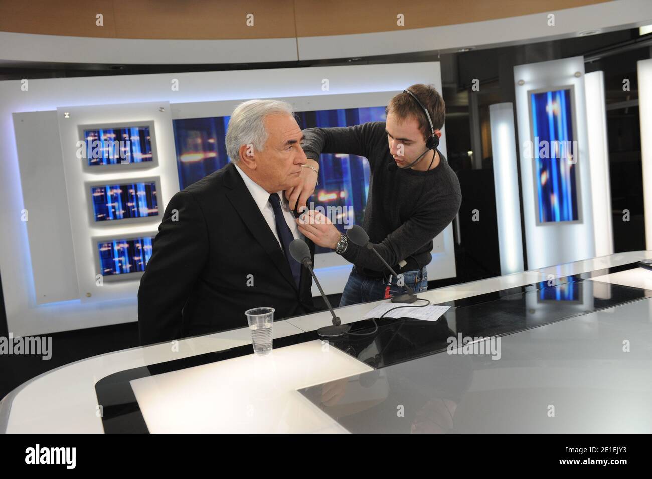 International Monetary Fund Managing Director, French Dominique Strauss-Kahn is pictured with French journalist Fabien Namias prior to an interview with TV anchor Laurent Delahousse during the French TV public channel France 2 evening news, in Paris, France on February 20, 2011. Photo by Mousse/ABACAPRESS.COM Stock Photo