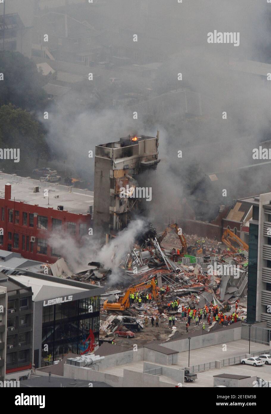 Rescue workers on the collapsed Pyne Gould Guiness Building in central Christchurch on 22 February 2011. Photo by Mark Mitchell/NZHerald/ABACAUSA.COM Stock Photo