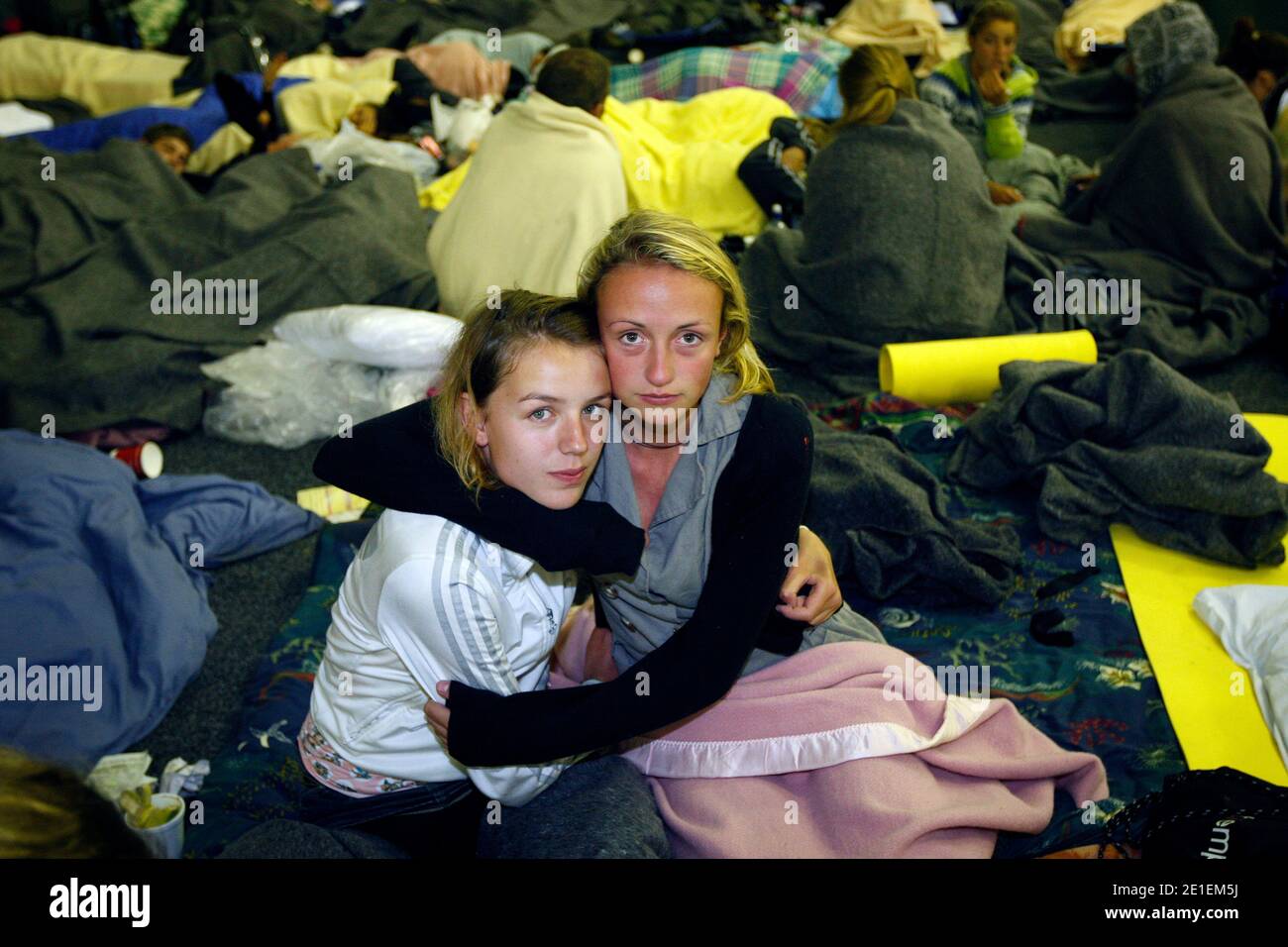 19-year-olds Carlijn De Hilster and Manouk De Vires from Holland, take refuge and sleep in an evacuation centre, set up at Hagley Park, after Christchurch was hit by a 6.3 magnitude earthquake today. The Brighton and Bexley areas were badly hit with flooding on 22 February 2011. Photo by Sarah Ivey/NZHerald/ABACAUSA.COM Stock Photo