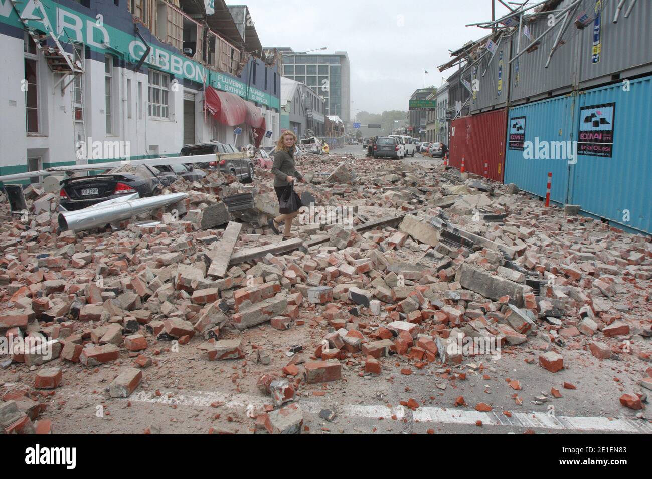 Christchurch Earthquake - 22 February 2011A lady visibly upset walks through the rubble on Madras Street DIGITAL PHOTO : GEOFF SLOAN NZH 24Feb11 - CRUSHED: Masonry from city buildings smashed into vehicles. PICTURE/ GEOFF SLOANDEBRIS: Manchester St in the central city is a scene of destruction. PICTURE / SIMON BAKERSURVIVOR: A distraught woman walks through rubble on Madras St. PICTURE / GEOFF SLOAN Stock Photo