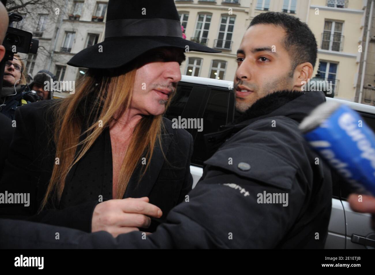 John Galliano is seen arriving at the 3rd arrondissement precinct where he should be confronted with a couple accusing him of anti-Semitic comments in Paris, France on February, 28, 2011. John Galliano, the chief designer at Christian Dior since 1996, has been suspended from his duties at the fashion house after he was arrested for allegedly assaulting a woman and making anti-Semitic remarks at an outdoor Paris cafe 'La Perle'. Photo by Mousse/ABACAPRESS.COM Stock Photo