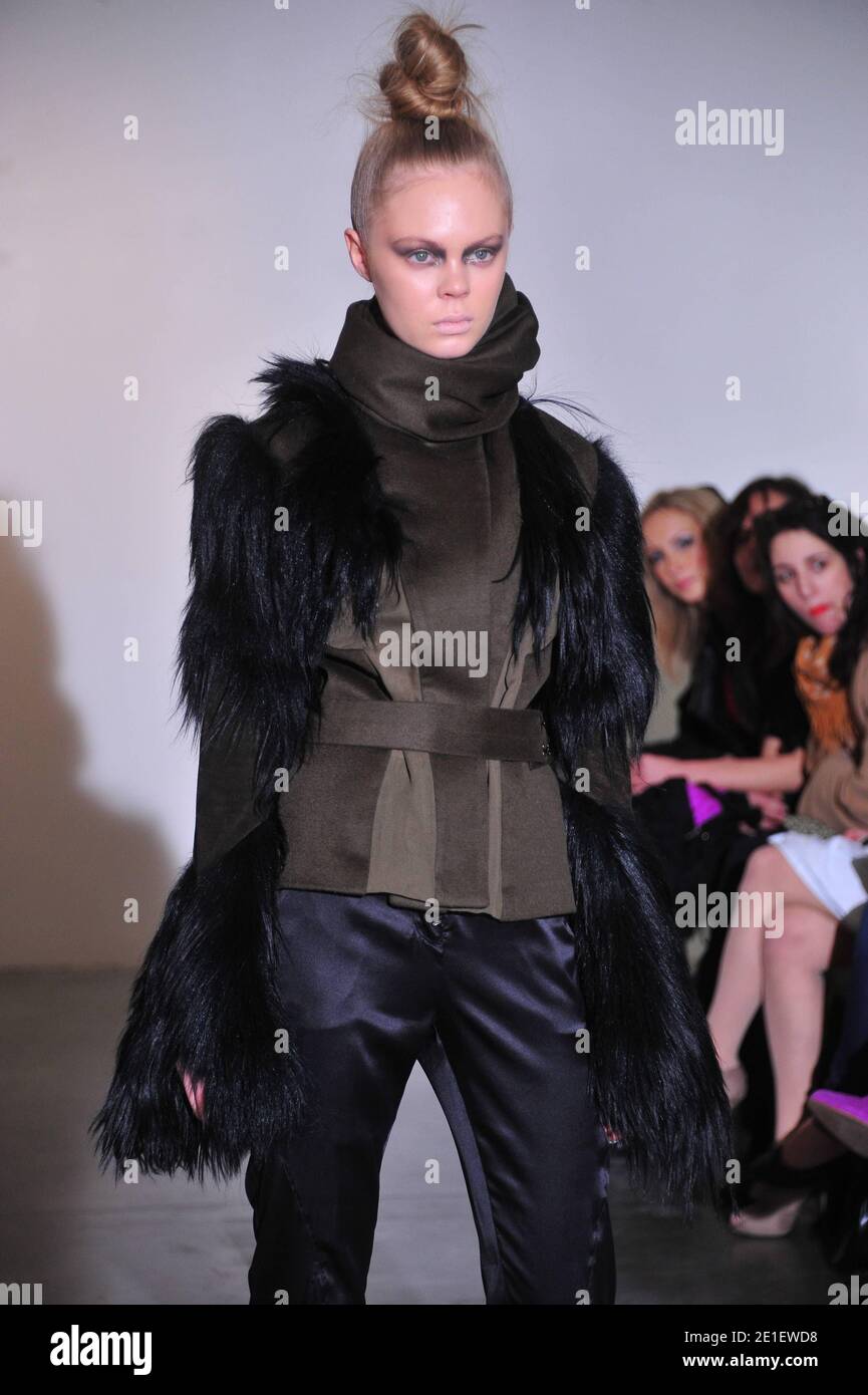 A model displays a creation designed by Harry Halim for his Fall-Winter ...