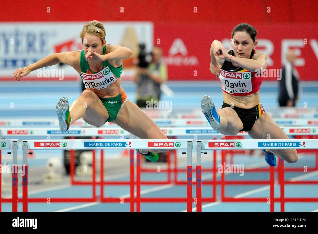 Derval O'Rourke of Ireland and Elisabeth Davin of Belgium compete in the Women's 60m hurdles heat 4 during day 1 of the 31st European Athletics Indoor Championships at the Palais Omnisports de Paris-Bercy in Paris, France on March 4, 2011. Photo by Stephane Reix/ABACAPRESS.COM. Stock Photo