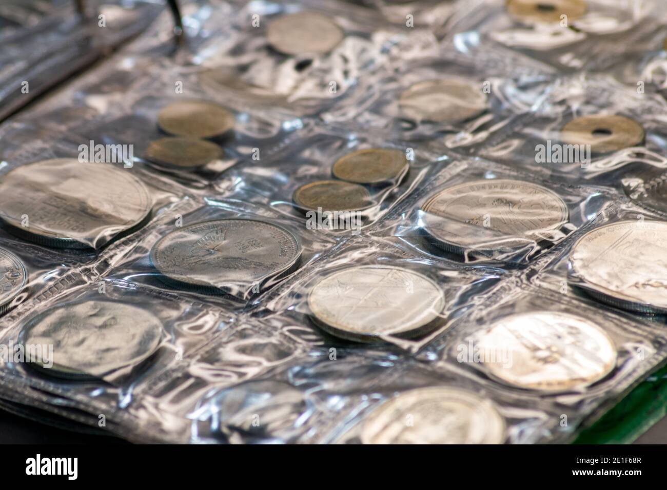 Coins collection on plastic cases Stock Photo Alamy