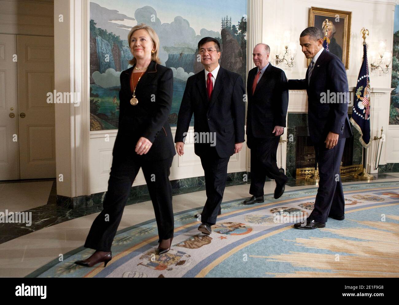 U.S. President Barack Obama, walks with Hillary Clinton, U.S. secretary of state, left, Gary Locke, secretary of commerce, and Tim Donilon, national security advisor, after announcing Locke's nomination to be the next U.S. ambassador to China at the White House in Washington, D.C., U.S., on March 9, 2011. If confirmed by the Senate, Locke would take over the diplomatic mission in a country that is a linchpin in Obama's trade policy. Photo by Joshua Roberts/Bloomberg News/ABACAUSA.COM Stock Photo