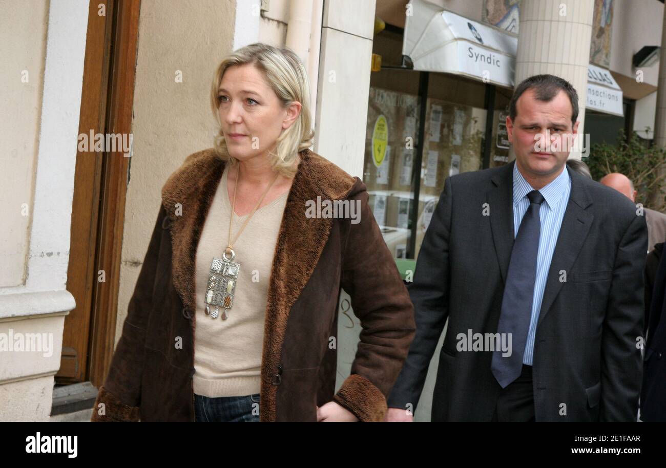 Member of the European Parliament and French far-right National Front  political party leader Marine Le Pen and french FN politician's Louis Aliot  are pictured after her press conference at the Mercure Hotel,