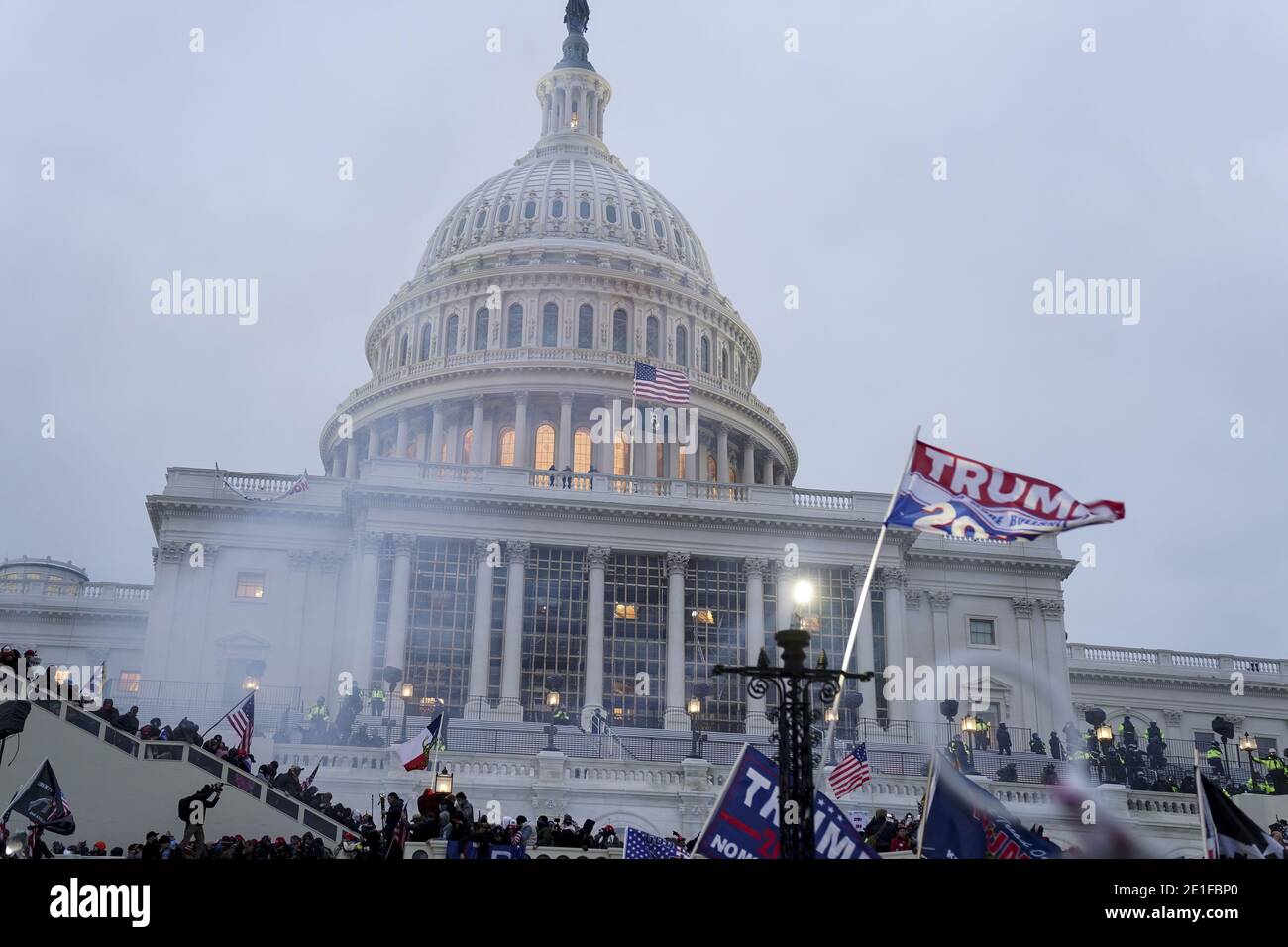 Washington, United States. 06th Jan, 2021. Trump supporters gather and march to protest against the Electoral College vote count that would certify President-elect Joe Biden as the winner in Washington, DC on Wednesday, January 6, 2021. Under federal law, Jan. 6 is the date Electoral College votes determining the next president are counted in a joint session of Congress. Photo by Leigh Vogel/UPI Credit: UPI/Alamy Live News Stock Photo
