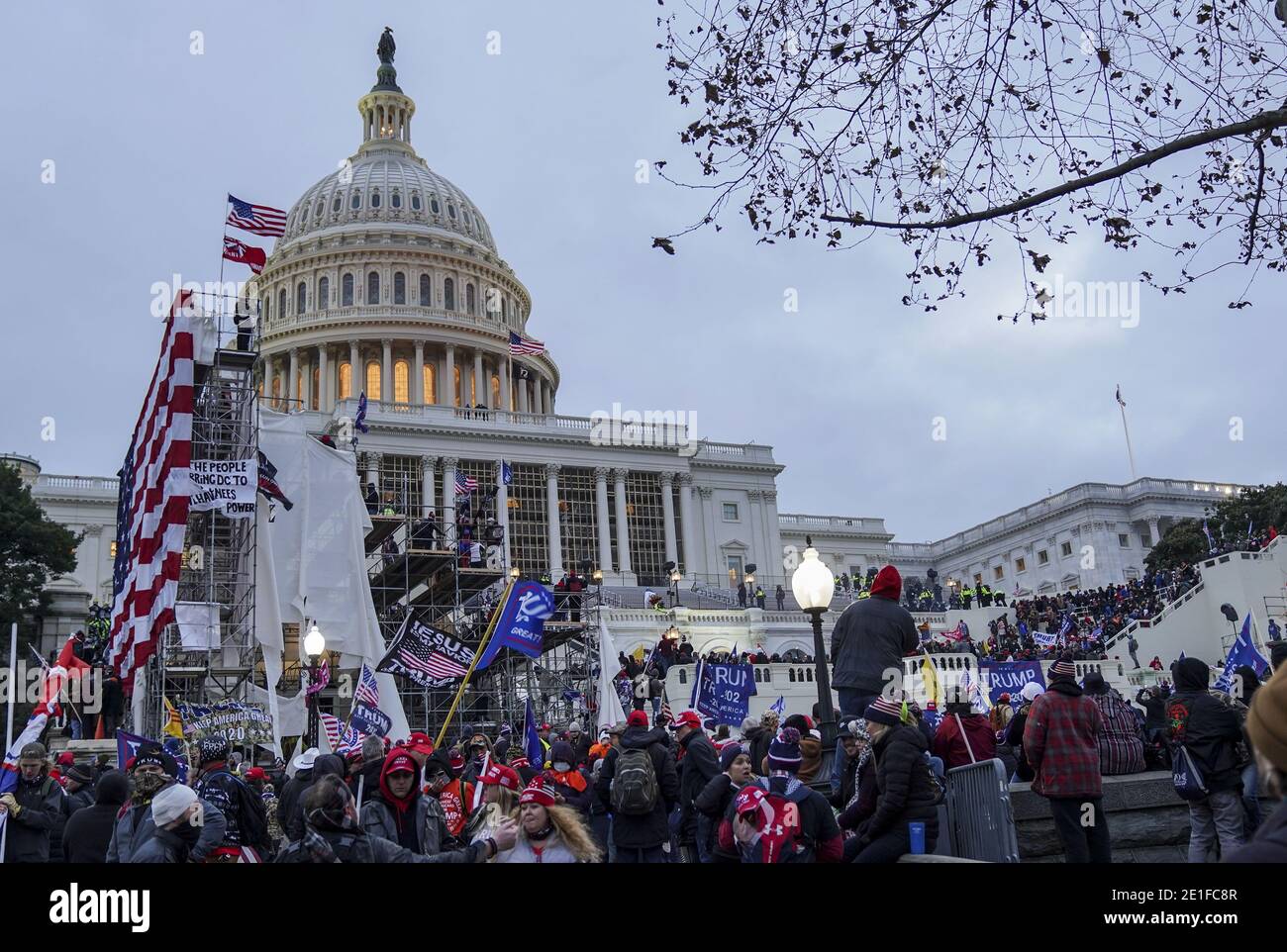 Washington, United States. 06th Jan, 2021. Trump supporters gather and march to protest against the Electoral College vote count that would certify President-elect Joe Biden as the winner in Washington, DC on Wednesday, January 6, 2021. Under federal law, Jan. 6 is the date Electoral College votes determining the next president are counted in a joint session of Congress. Photo by Leigh Vogel/UPI Credit: UPI/Alamy Live News Stock Photo