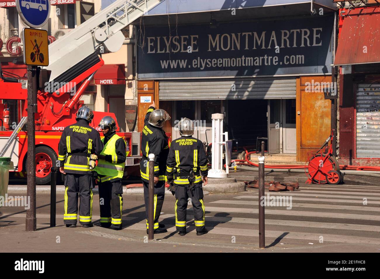 Smoke rises near the Sacre-Coeur de Montmartre basilica, in Paris, France on March 22, 2011, from the Elysee Montmartre music hall where a fire broke out this morning. The cabaret, created in the XVIIIth century, is one of the birth places of famous French Cancan. Photo by ABACAPRESS.COM Stock Photo