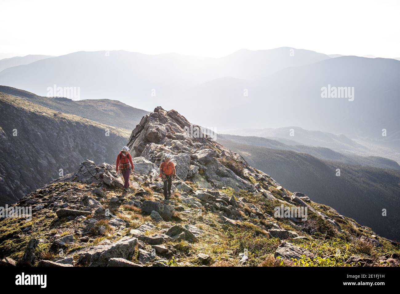 Alexandra Roberts and David Lottman (L to R) walk along the ridge of ...