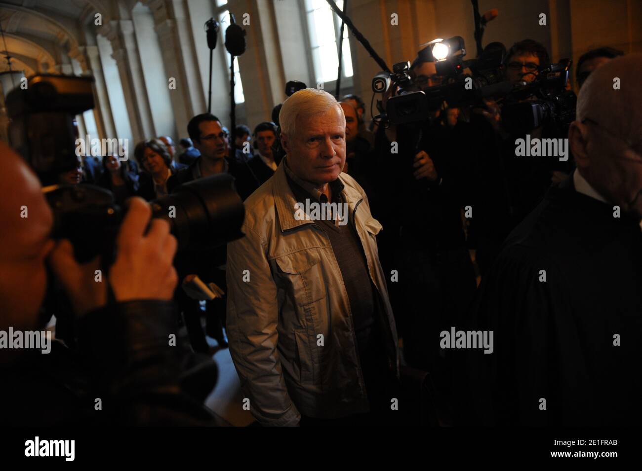 Frenchman Andre Bamberski arrives at the Palais de Justice to attend German cardiologist Dieter Krombach's trial for the murder of Kalinka Bamberski, in Paris, France on March 29, 2011. The German doctor is accused of having raped and killed his then 14-year-old stepdaughter, Kalinka Bamberski, in the summer of 1982 while she was holidaying with her mother at Krombach's home at Lake Constance, southern Germany. A court in Germany ruled that Krombach could not be held responsible for the death, but in 1995 a court in Paris found the doctor guilty of manslaughter and sentenced him in absentia to Stock Photo