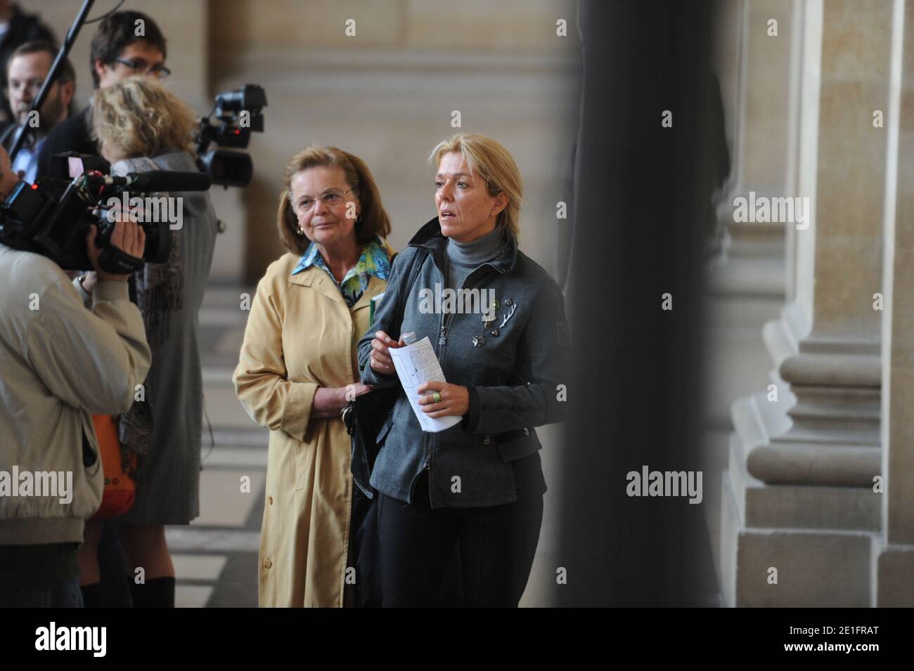 Krombach's sister and Diana Gunther the daughter of German cardiologist Dieter Krombach, arrive at the Palais de Justice to attend her father, German cardiologist Dieter Krombach's trial for the murder of Kalinka Bamberski, in Paris, France on March 29, 2011. The German doctor is accused of having raped and killed his then 14-year-old stepdaughter, Kalinka Bamberski, in the summer of 1982 while she was holidaying with her mother at Krombach's home at Lake Constance, southern Germany. A court in Germany ruled that Krombach could not be held responsible for the death, but in 1995 a court in Pari Stock Photo