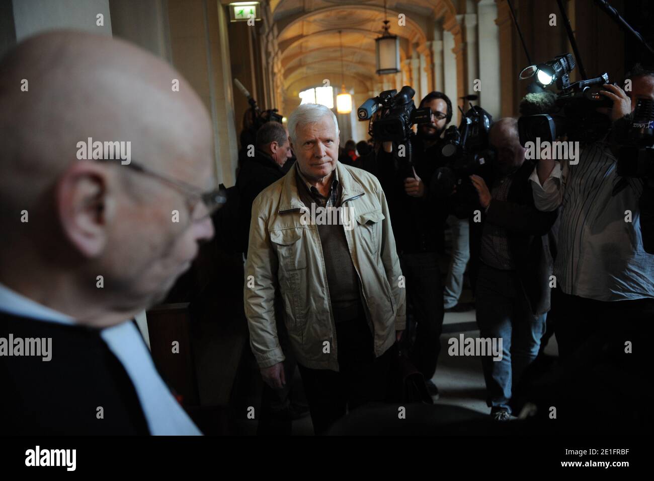Frenchman Andre Bamberski arrives with his lawyer Francois Gibault (L) at the Palais de Justice to attend German cardiologist Dieter Krombach's trial for the murder of Kalinka Bamberski, in Paris, France on March 29, 2011. The German doctor is accused of having raped and killed his then 14-year-old stepdaughter, Kalinka Bamberski, in the summer of 1982 while she was holidaying with her mother at Krombach's home at Lake Constance, southern Germany. A court in Germany ruled that Krombach could not be held responsible for the death, but in 1995 a court in Paris found the doctor guilty of manslaug Stock Photo