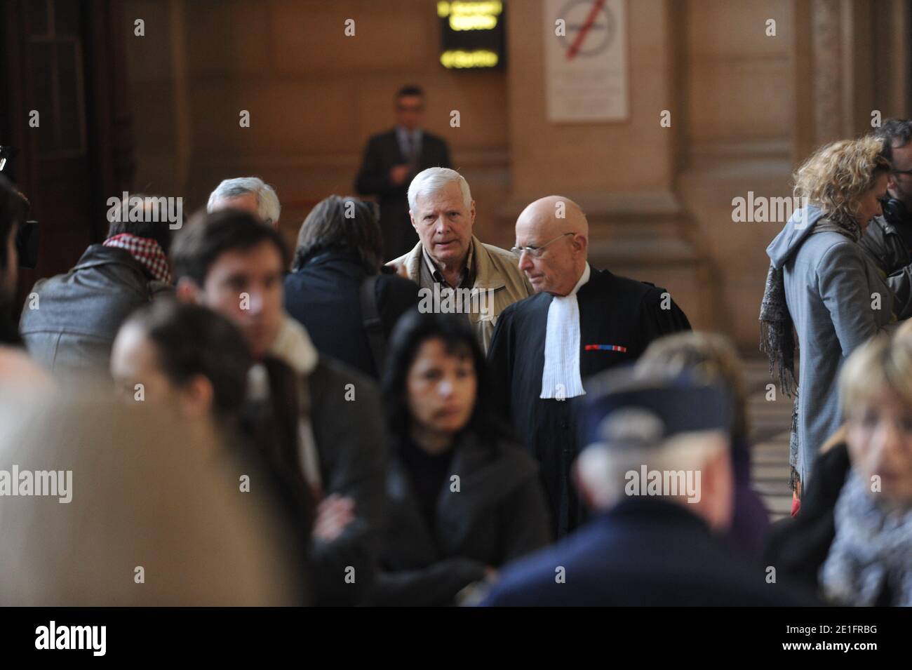 Frenchman Andre Bamberski arrives with his lawyer Francois Gibault at the Palais de Justice to attend German cardiologist Dieter Krombach's trial for the murder of Kalinka Bamberski, in Paris, France on March 29, 2011. The German doctor is accused of having raped and killed his then 14-year-old stepdaughter, Kalinka Bamberski, in the summer of 1982 while she was holidaying with her mother at Krombach's home at Lake Constance, southern Germany. A court in Germany ruled that Krombach could not be held responsible for the death, but in 1995 a court in Paris found the doctor guilty of manslaughter Stock Photo