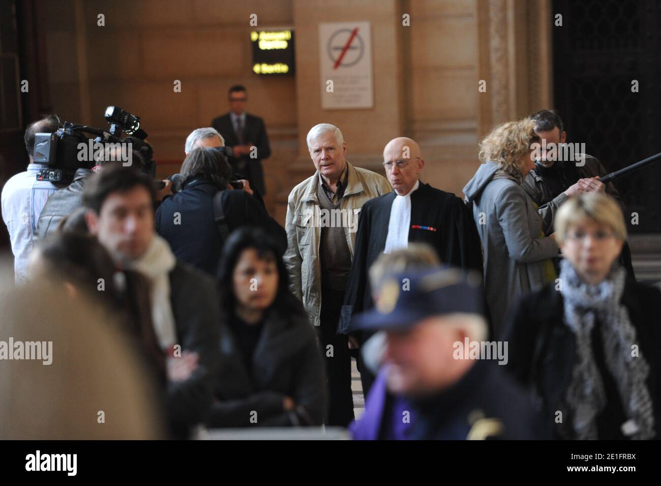 Frenchman Andre Bamberski arrives with his lawyer Francois Gibault at the Palais de Justice to attend German cardiologist Dieter Krombach's trial for the murder of Kalinka Bamberski, in Paris, France on March 29, 2011. The German doctor is accused of having raped and killed his then 14-year-old stepdaughter, Kalinka Bamberski, in the summer of 1982 while she was holidaying with her mother at Krombach's home at Lake Constance, southern Germany. A court in Germany ruled that Krombach could not be held responsible for the death, but in 1995 a court in Paris found the doctor guilty of manslaughter Stock Photo