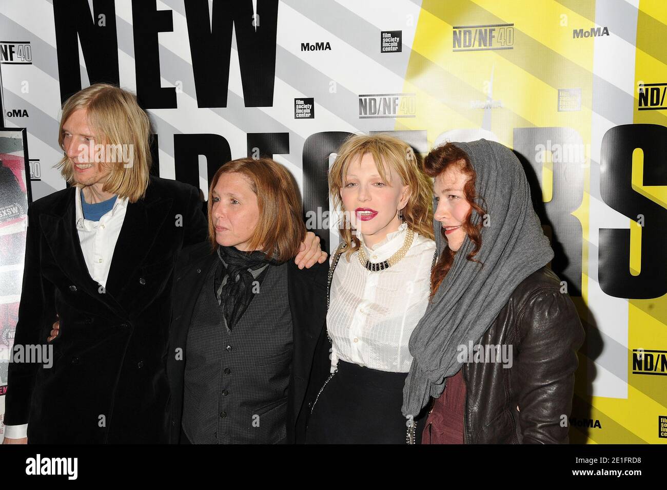 Hole band members L-R: Eric Erlandson, Patty Schemel, Courtney Love and Melissa auf der Maur attending the premiere of P. David Ebersole's documentary 'Hit So Hard' held at the Museum of Modern Art in New York City, NY, USA, on March 28, 2011. Photo by Graylock/ABACAPRESS.COM Stock Photo
