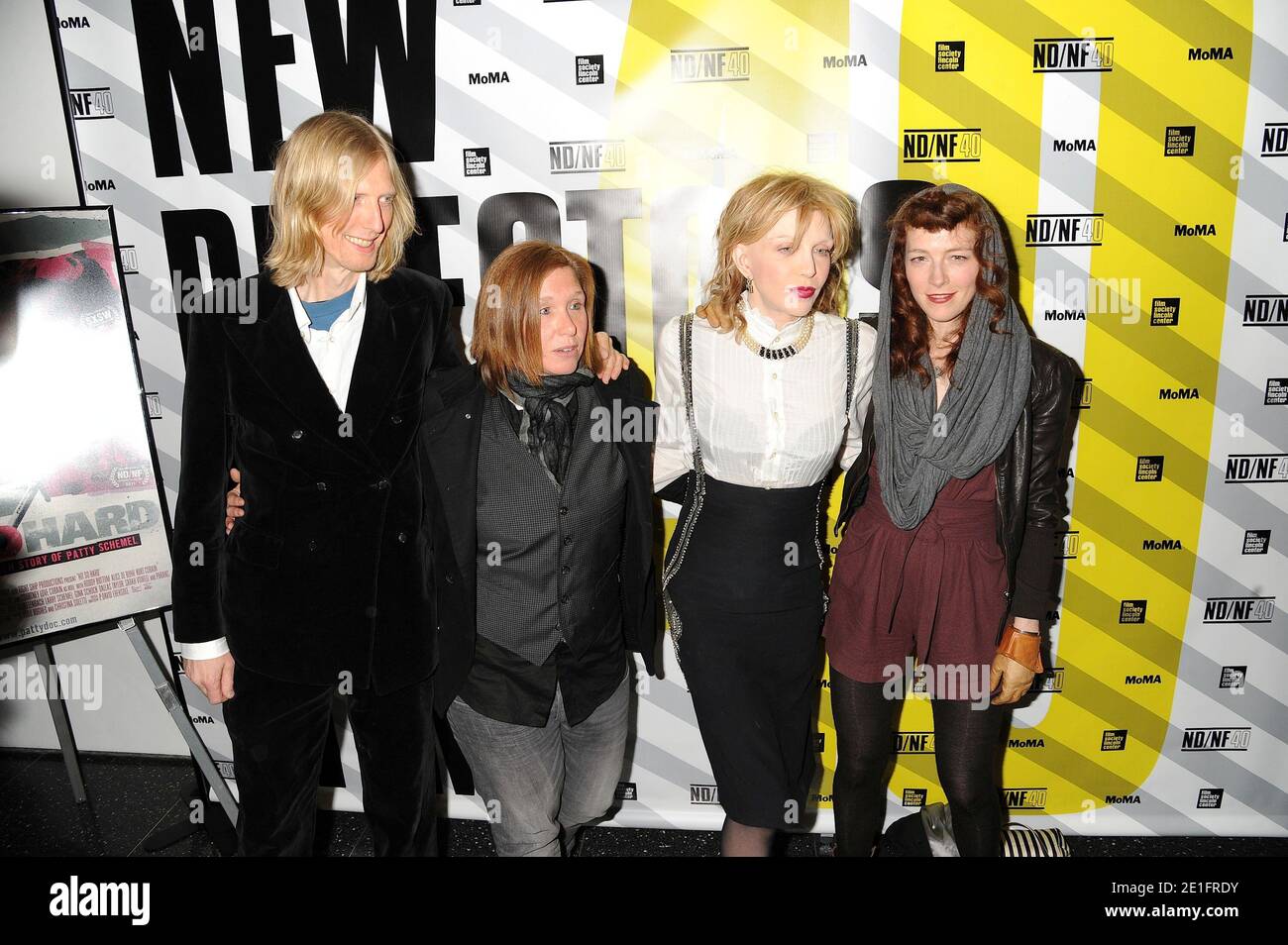 Hole band members L-R: Eric Erlandson, Patty Schemel, Courtney Love and Melissa auf der Maur attending the premiere of P. David Ebersole's documentary 'Hit So Hard' held at the Museum of Modern Art in New York City, NY, USA, on March 28, 2011. Photo by Graylock/ABACAPRESS.COM Stock Photo